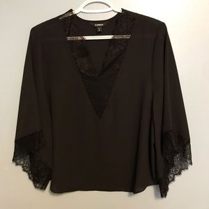 Black lacy express blouse. Size XS.